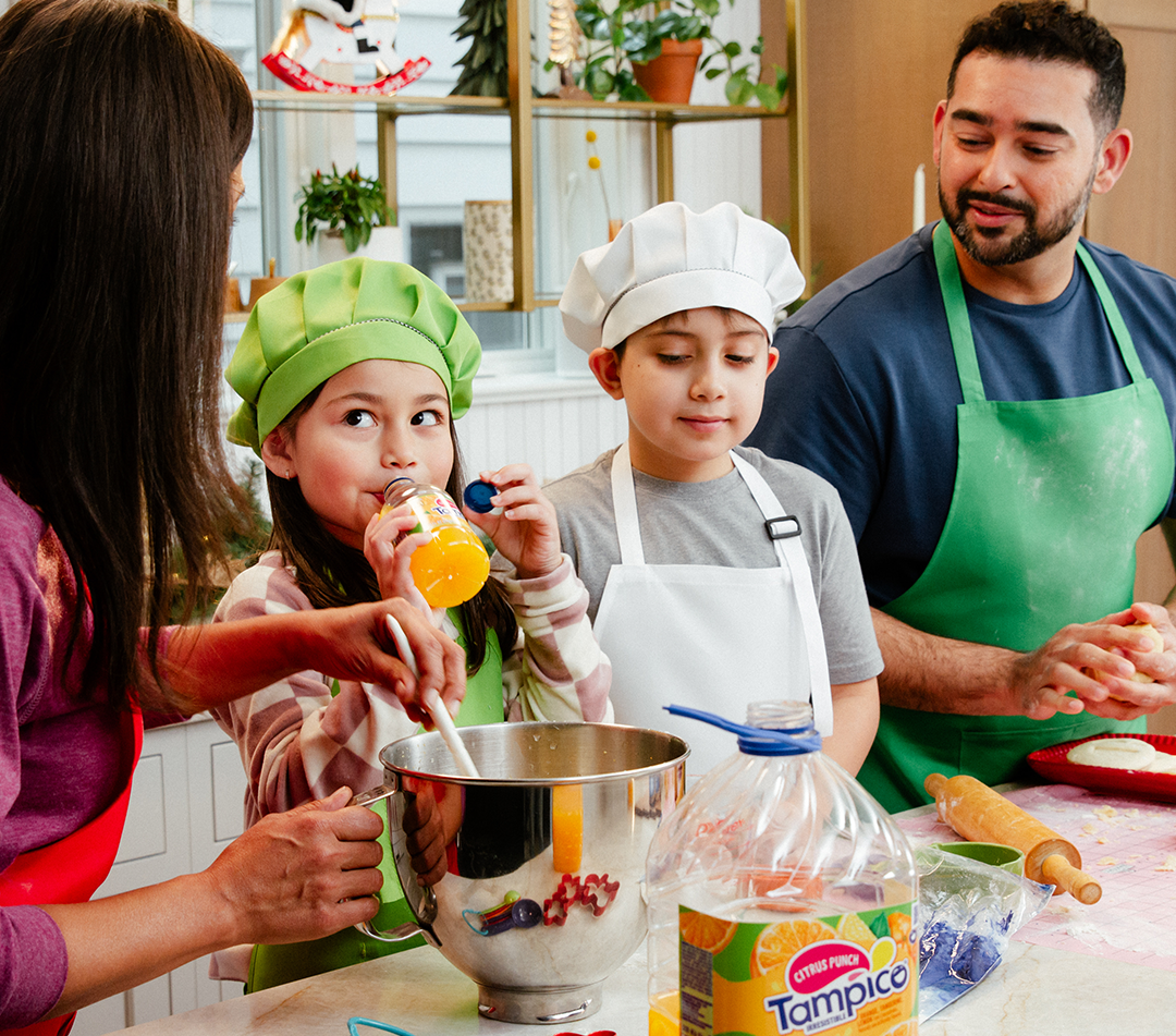portfolio-2 a family enjoys cooking in the kitchen